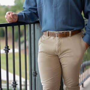 Uptown Tan Belt on a model in khakis